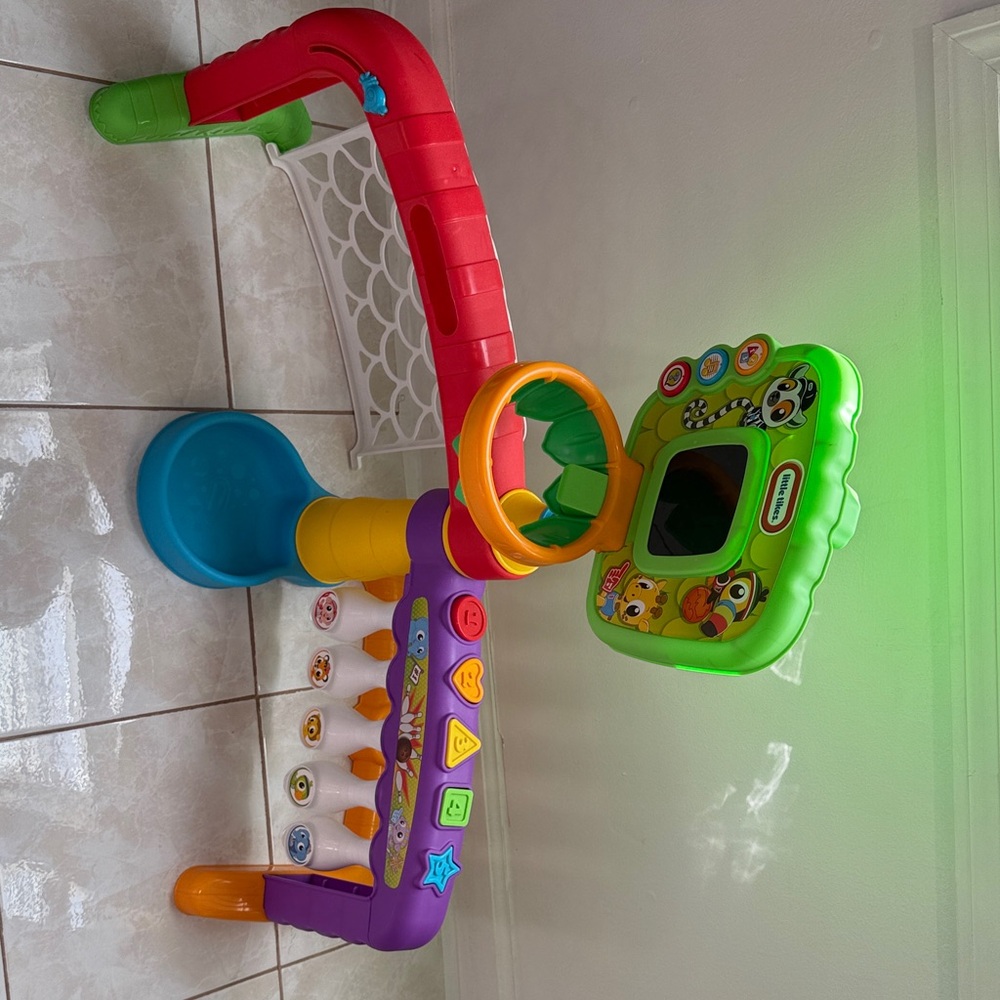 Little tikes basketball soccer and bowling set.